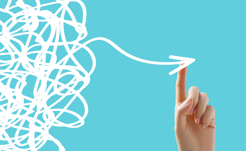 Graphic of a finger pulling an arrow out of a tangled lines