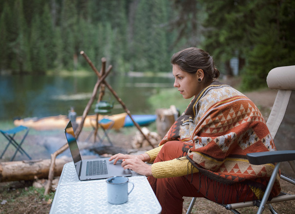 Camper working at laptop