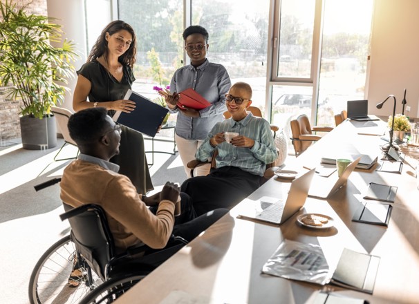 Group of coworkers having a fun conversation.