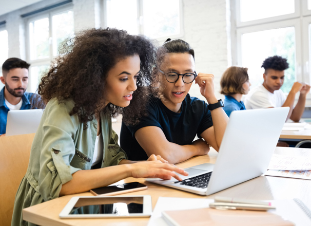 Classmates are learning through laptop