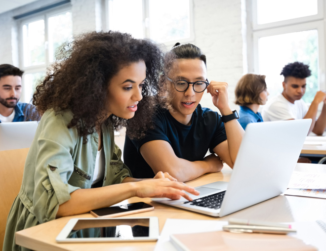 Classmates are learning through laptop