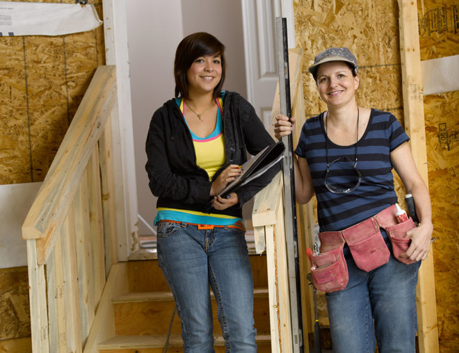 Youth and construction worker at a construction site