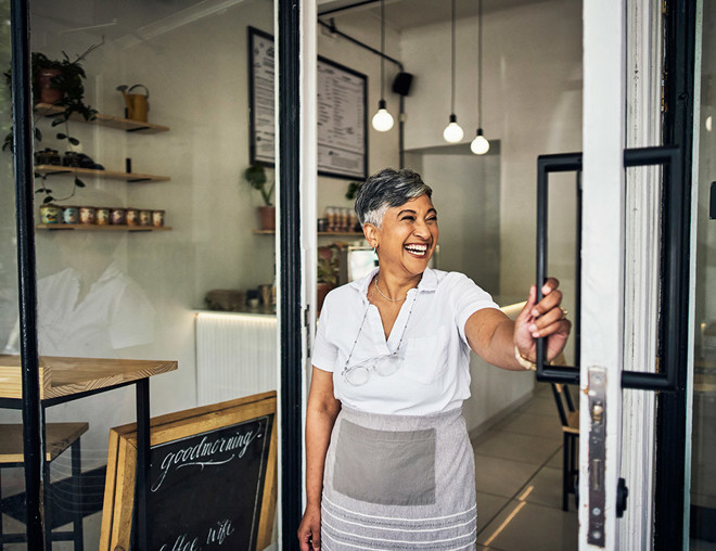Business owner opening up cafe