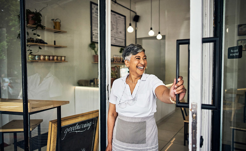 Business owner opening up cafe
