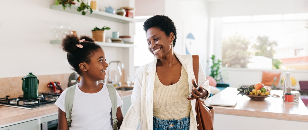 Mother and daughter leaving the house together in the morning.