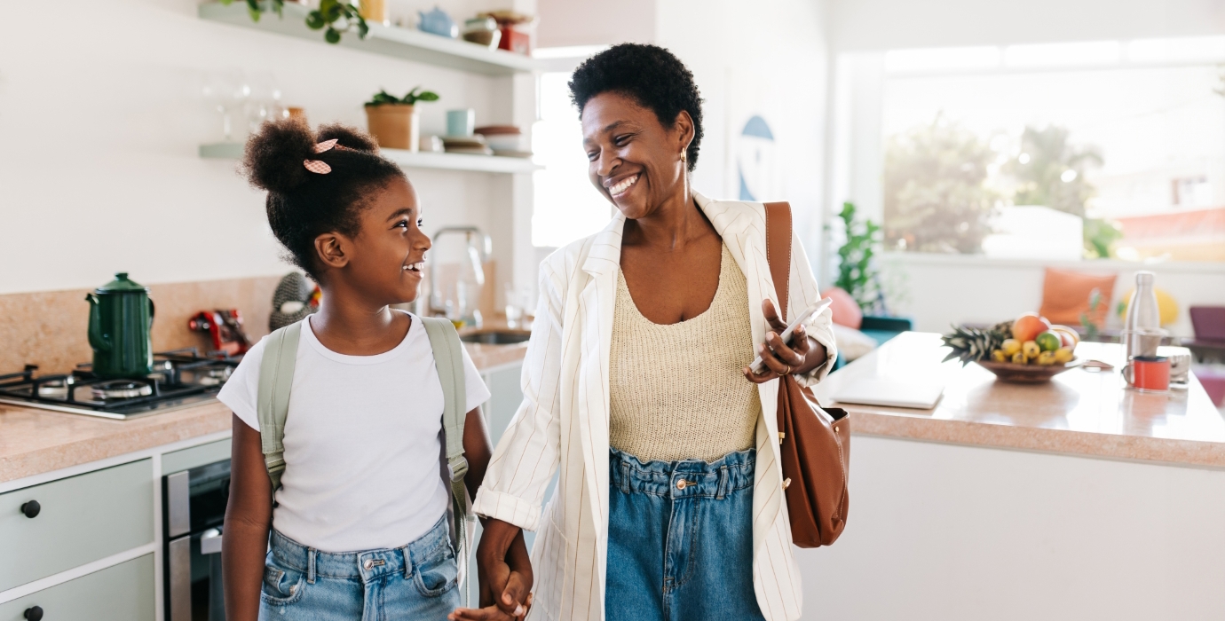 Mother and daughter leaving the house together in the morning. 