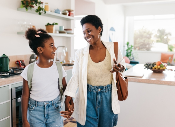 Mother and daughter leaving the house together in the morning. 