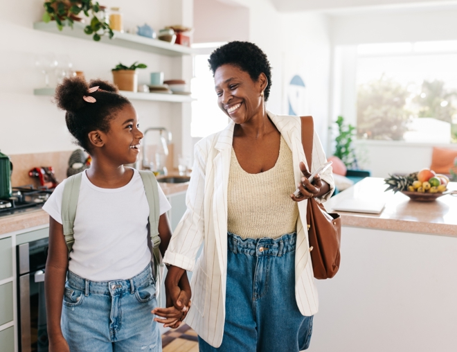 Mother and daughter leaving the house together in the morning. 