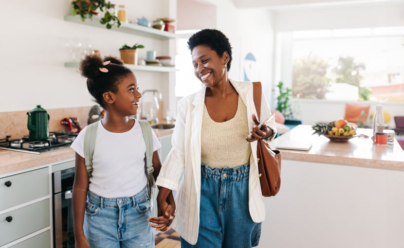 Mother and daughter leaving the house together in the morning. 