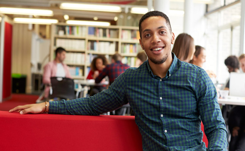 University student working in library