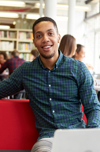 University student working in library