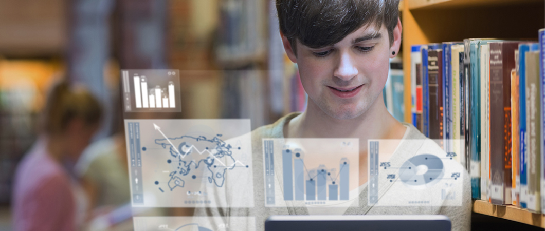 Student looking at a table with graphic overlay of graphs coming out from the tablet