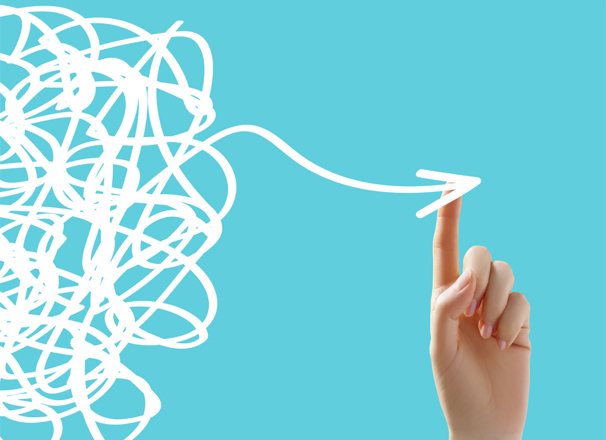 Graphic of a finger pulling an arrow out of a tangled lines