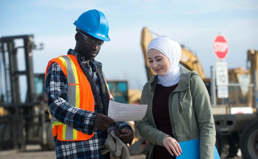Employees on a jobsite having a discussion