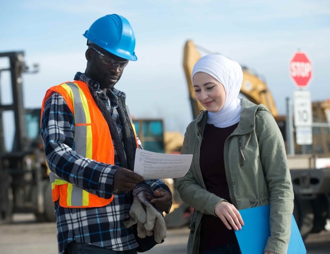 Employees on a jobsite having a discussion