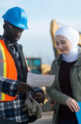 Employees on a jobsite having a discussion