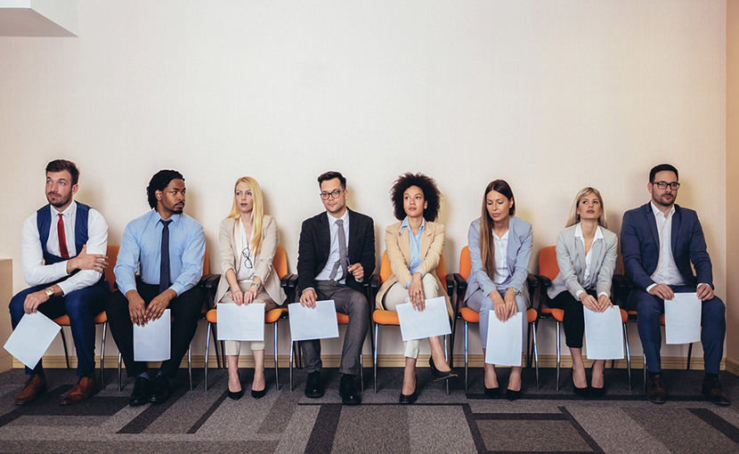 People waiting in an interview lineup