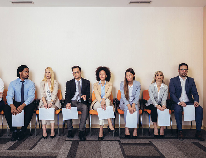 People waiting in an interview lineup