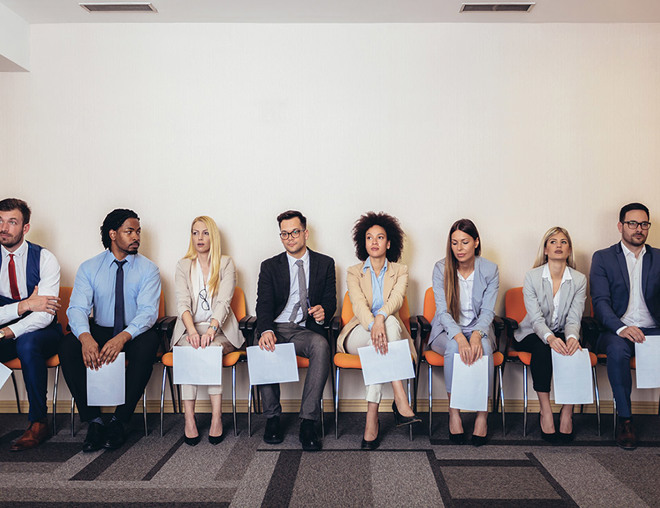 People waiting in an interview lineup