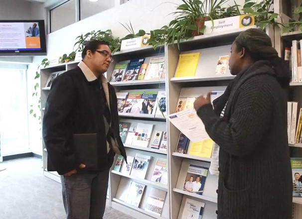 Job seeker discussing with career counsellor at an Alberta Supports Centre