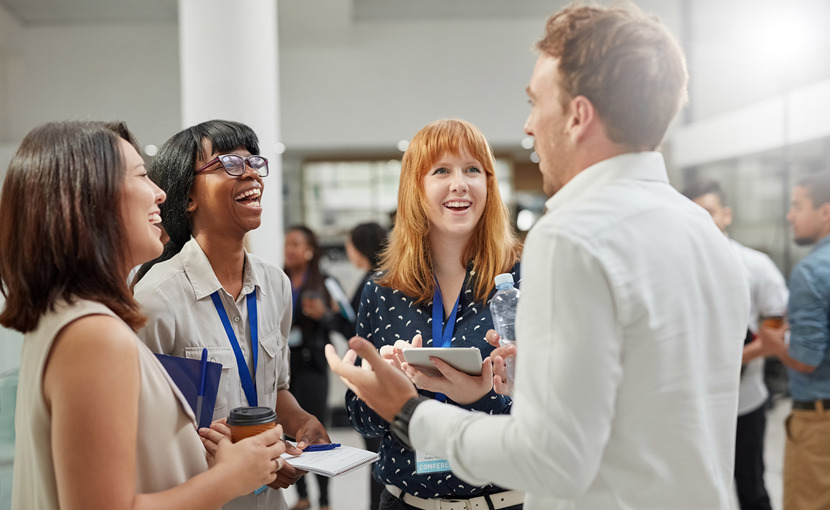 People networking in an office