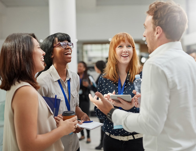 People networking in an office