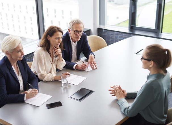 Interviewee during a job interview with a panel of 3 interviewers