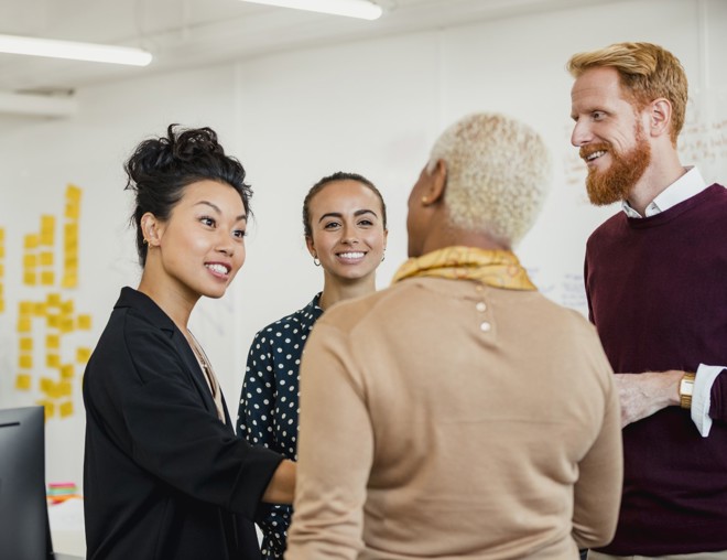 People networking and brainstorming in an office