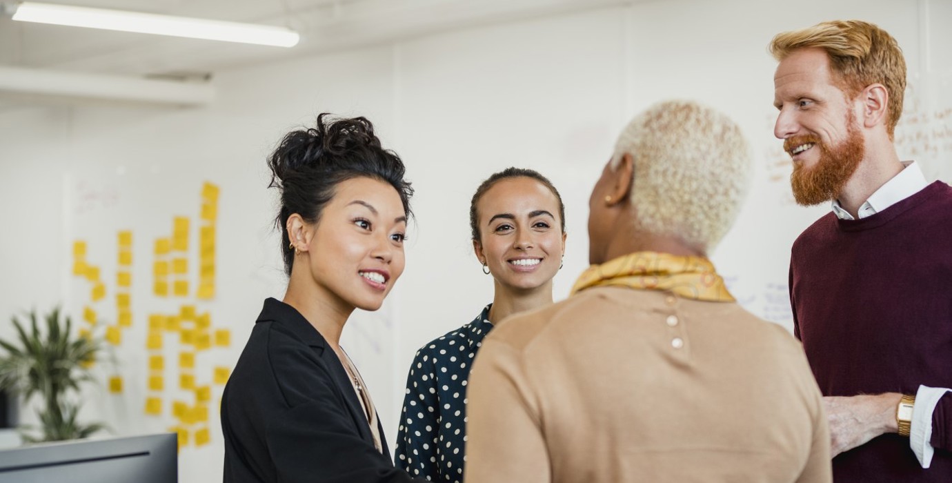 People networking and brainstorming in an office