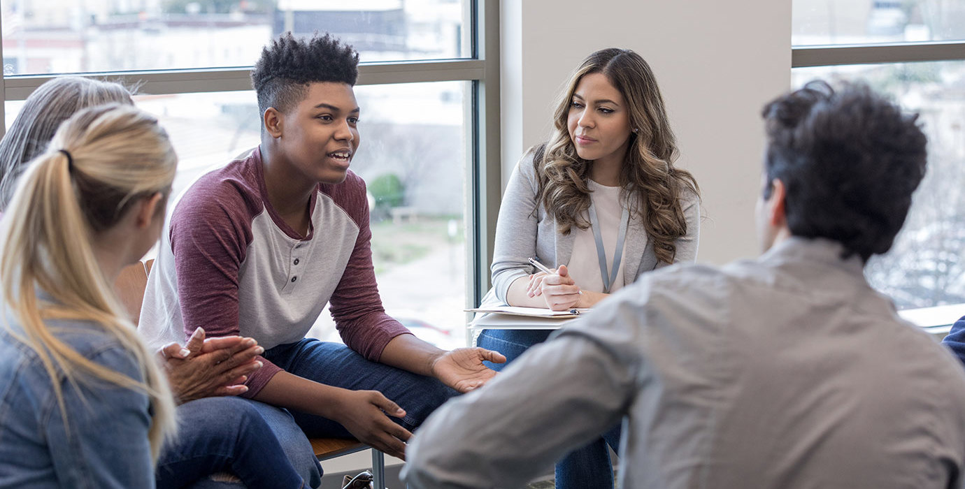 Youth in a group therapy session.