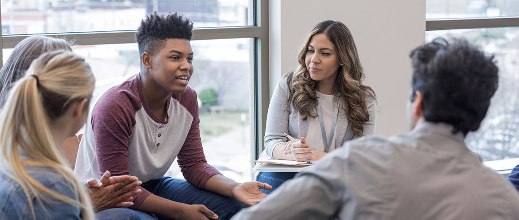 Youth in a group therapy session.