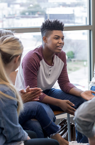 Youth in a group therapy session.