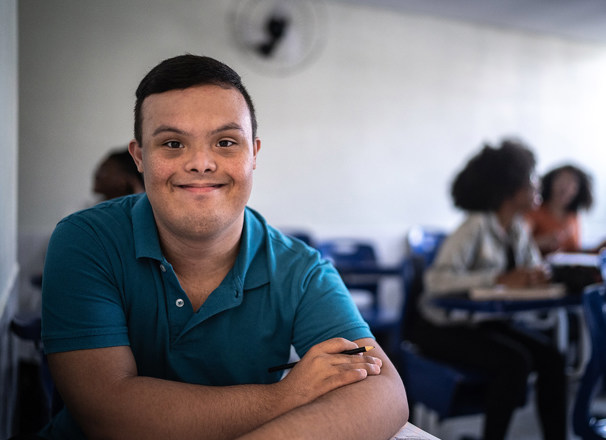Smiling student in a classroom