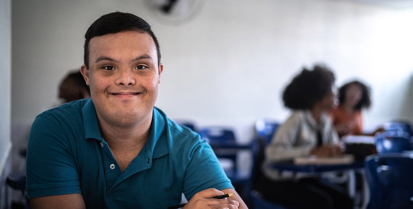 Smiling student in a classroom