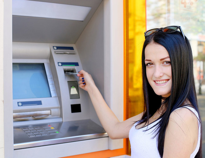 Person using an ATM