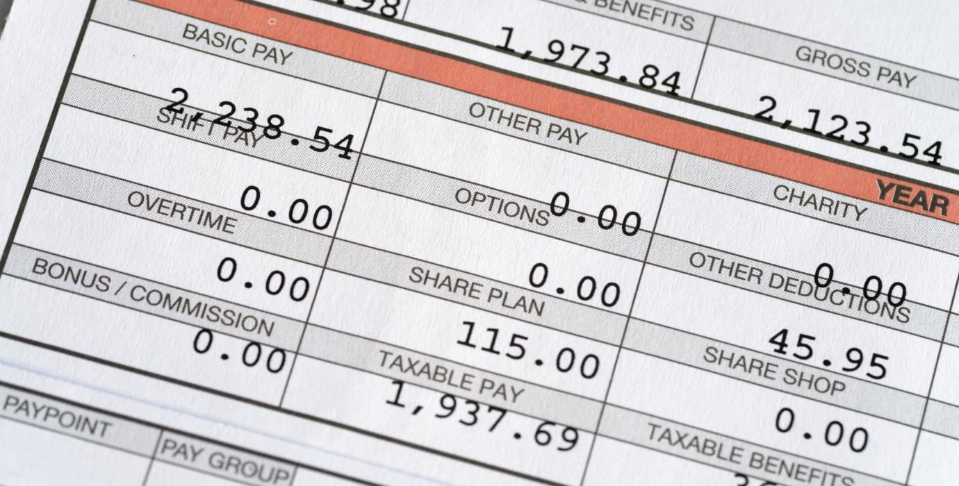 A pay stub showing a worker's pay and deductions.