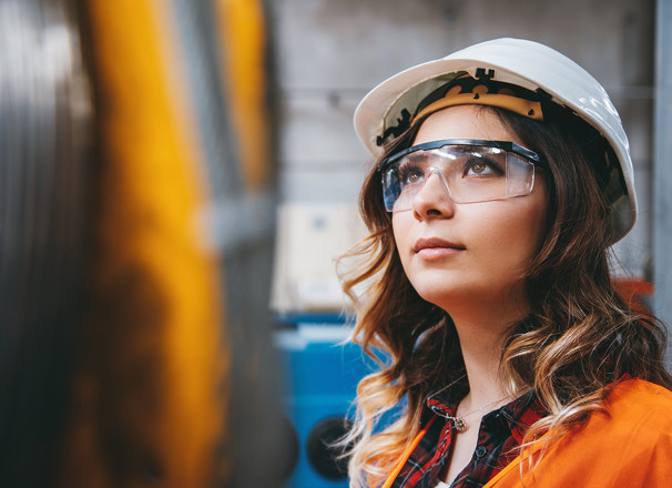 Person wearing a hard hat and PPE