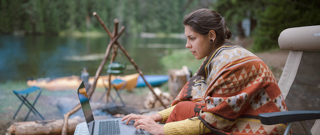 Camper working at laptop