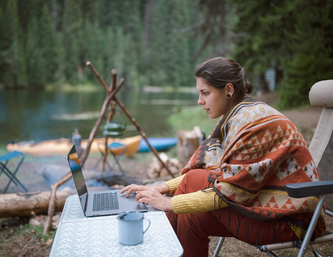 Camper working at laptop