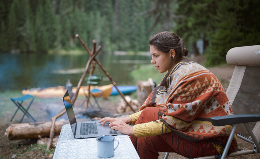 Camper working at laptop