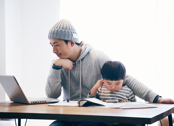 Father with son working from home