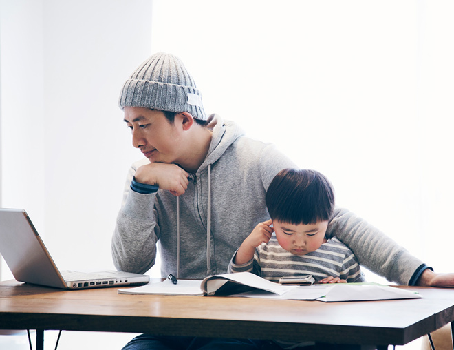 Father with son working from home