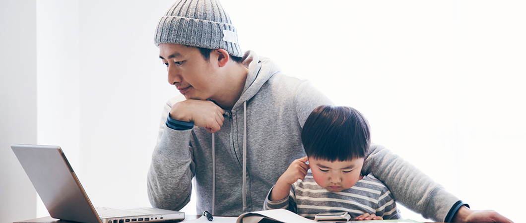 Father with son working from home