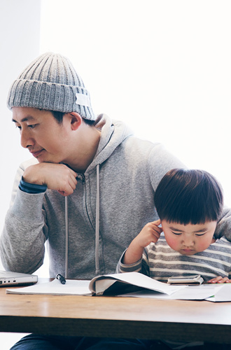 Father with son working from home