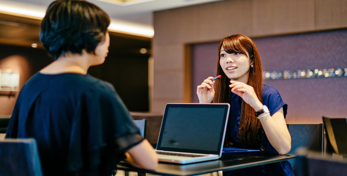 Two people discussing a job.