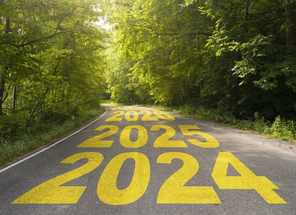 The years 2024, 2025, and 2026 shown consecutively on a paved road.