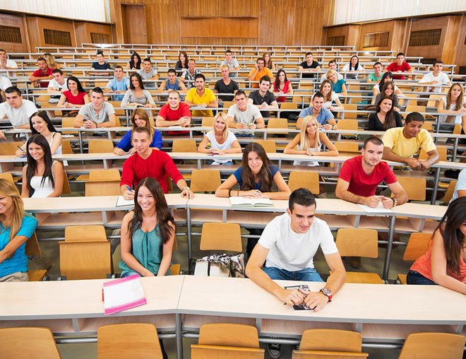 Large group of students in a university classroom