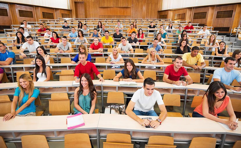Large group of students in a university classroom