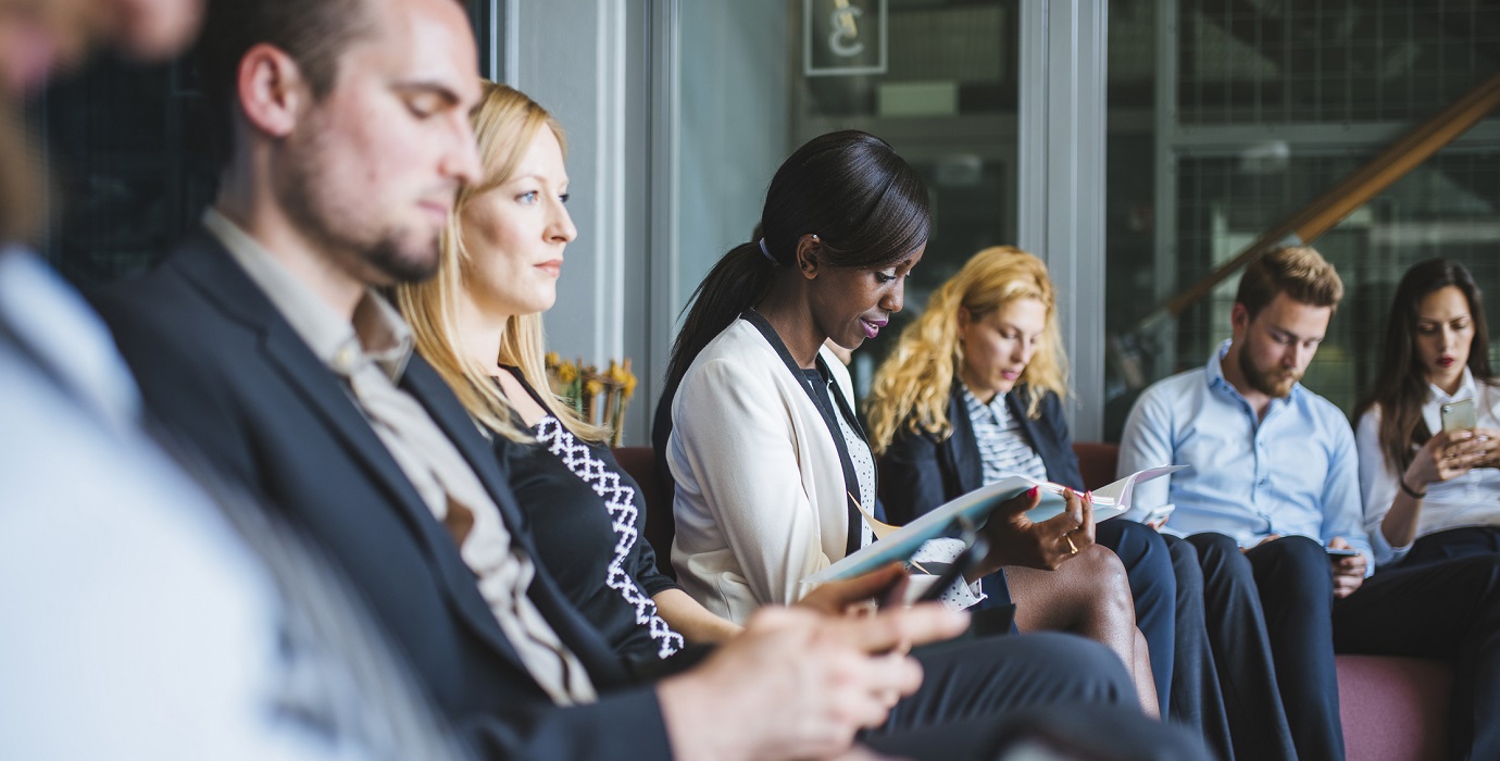 Group of people waiting for a job interview.