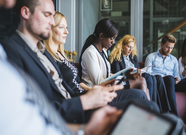 Group of people waiting for a job interview.